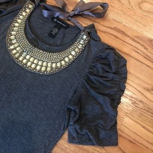 INC top w/ adorned necklace.